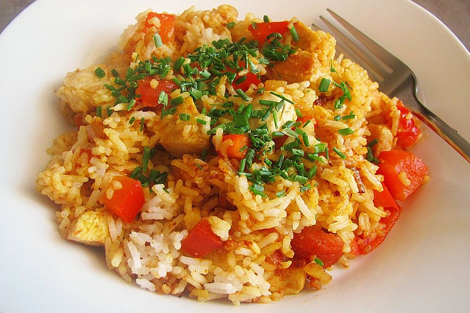 Hähnchenbrustfilet mit Paprika, Tomaten und Reis