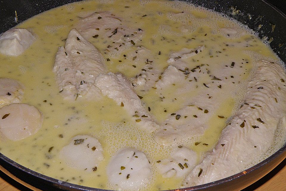 Fischfilet und Jakobsmuscheln in Weißwein-Sahne-Sauce Italia alla Mäusle