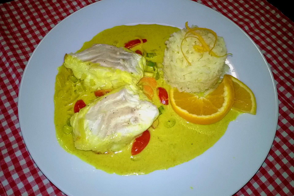 Fischfilet in Kurkuma-Senf-Sauce mit Orangenreis