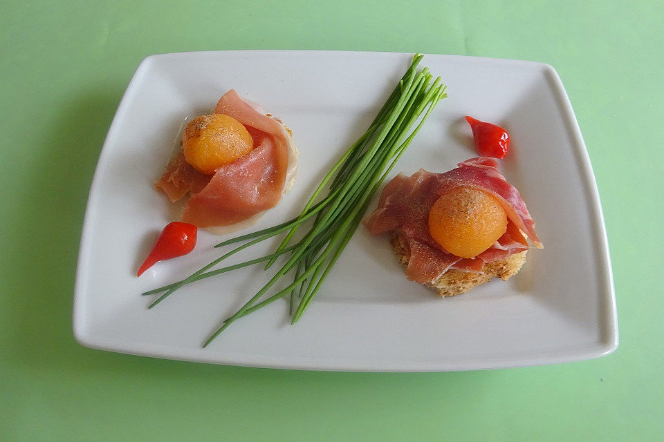 Canapes mit Parmaschinken und Melone