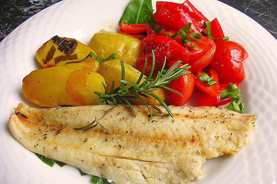 Fischfilet mediterran  mit Kartoffeln und Tomaten