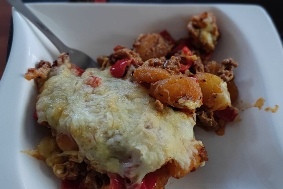 Gratinierte Gnocchi mit Hackfleisch und Champignons