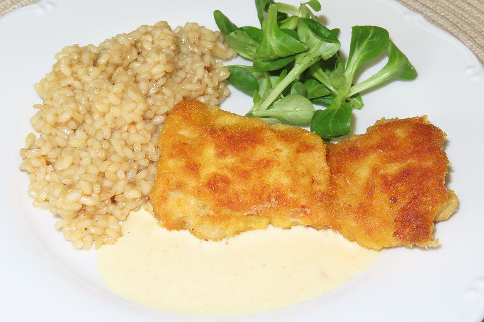 Käseschnitzel mit Käsesoße und Risotto