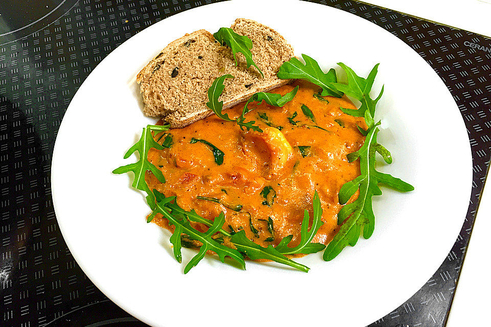 Riesengarnelen in Rucola-Tomaten-Sahnesoße