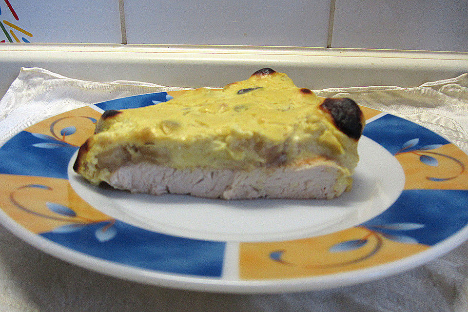 Putenschnitzel mit  Banane und Frischkäsecreme überbacken