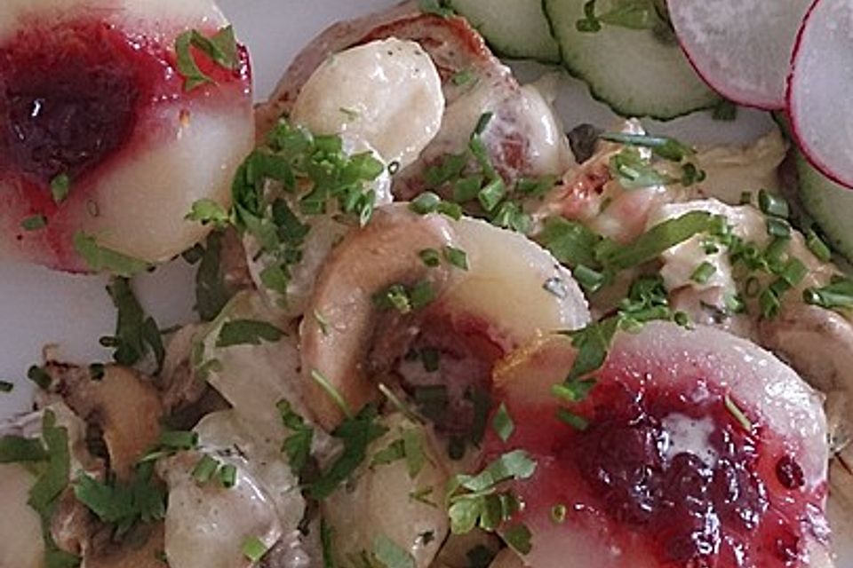 Gratin mit Schweinefilet, Gnocchi, Birnen, Preiselbeeren und Brie Gratin mit Schweinefilet, Gnocchi, Birnen, Preiselbeeren und Brie