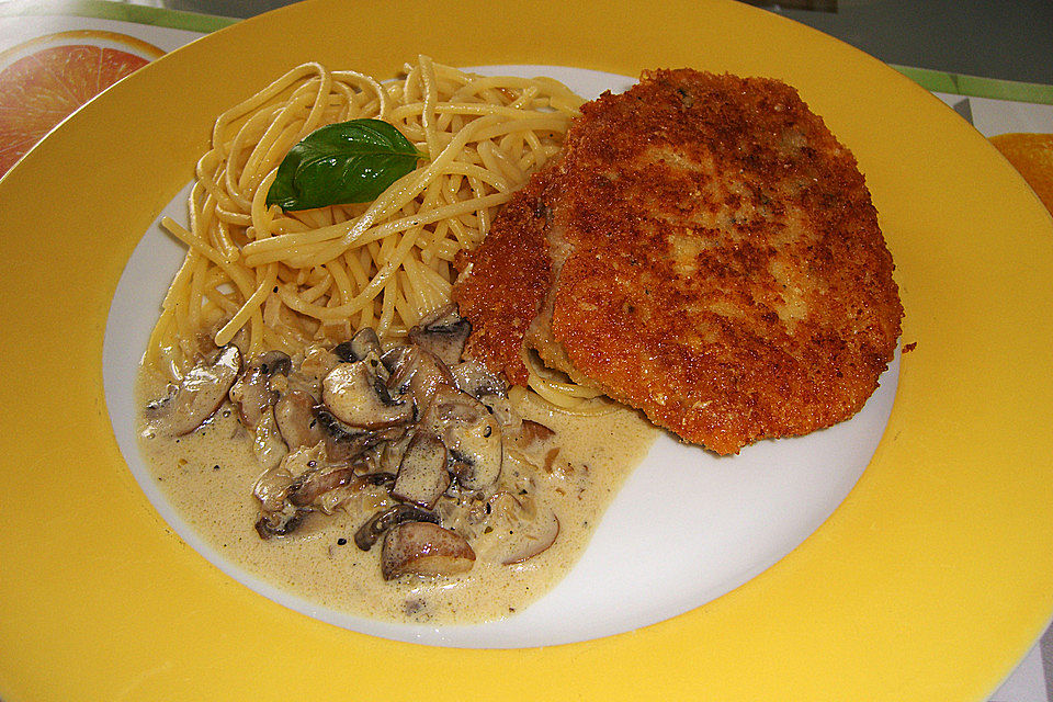 Schweinefilet in Parmesanpanade mit Zitronenspaghetti