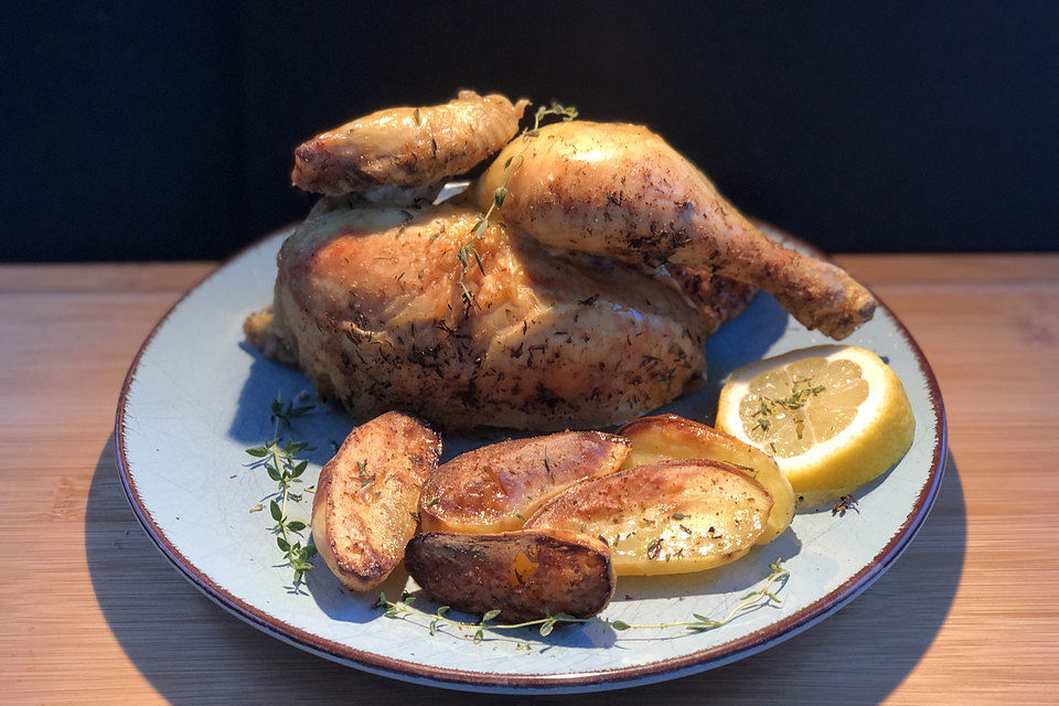 Brathähnchen vom Blech mit Zitrone und Kartoffeln