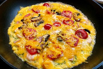 Omelette mit Tomaten und Pilzen