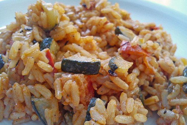 Puten-Reispfanne mit Tomaten und Zucchini von jopa942| Chefkoch