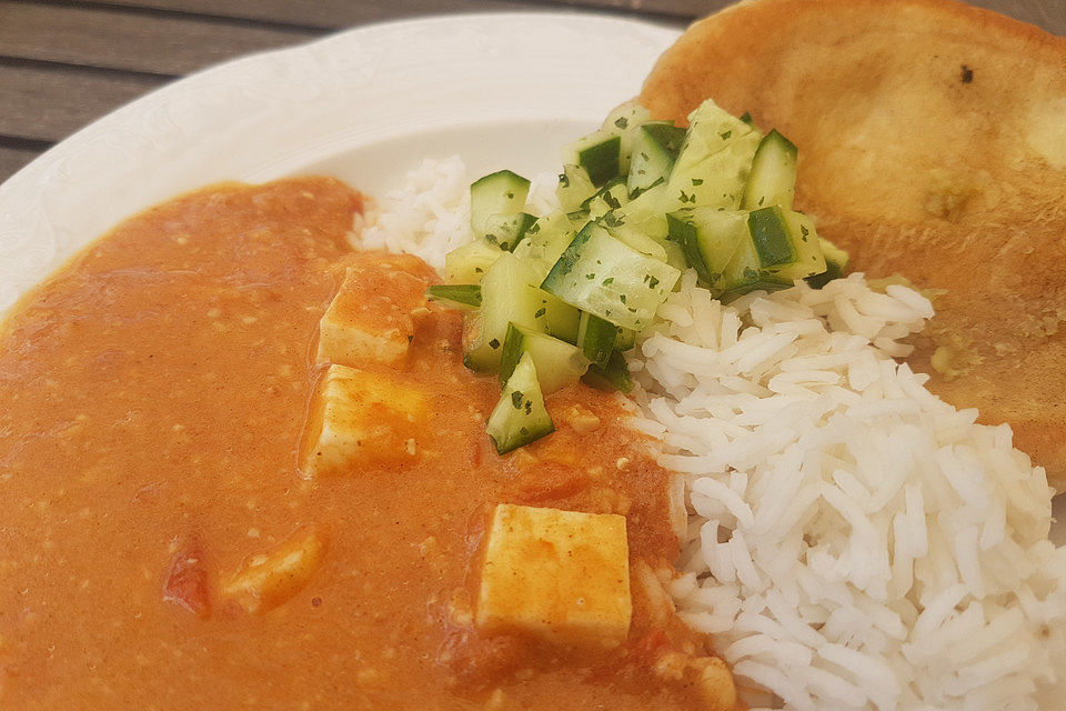 Curry mit Tomaten und Paneer