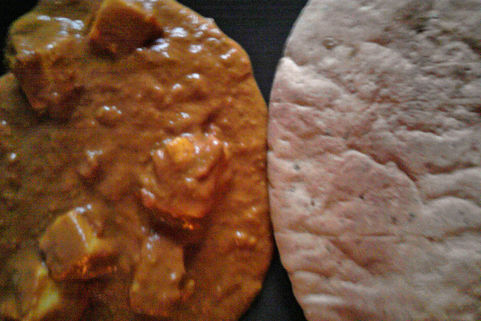 Curry mit Tomaten und Paneer