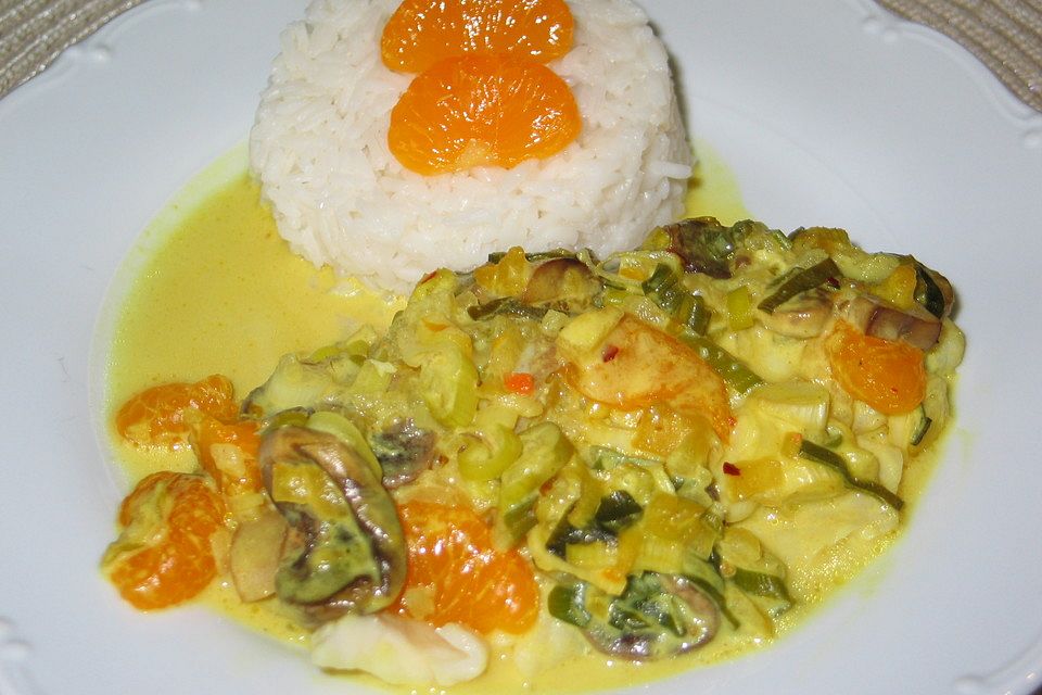 Gebackenes Kabeljaufilet mit  Mandarinen in Currysoße