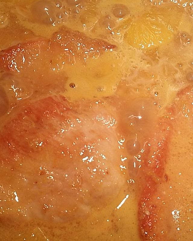 Truthahnschnitzel mit Orangenscheiben