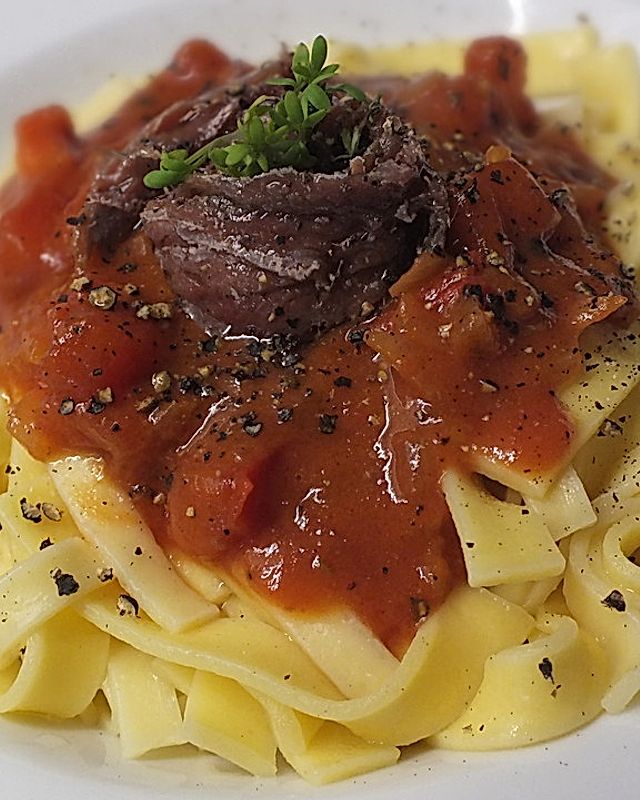 Spaghetti mit Sardellen und Tomaten