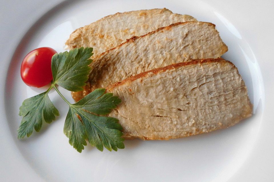 Schinkenschnitzelbraten mit Senf-Paprika-Kruste