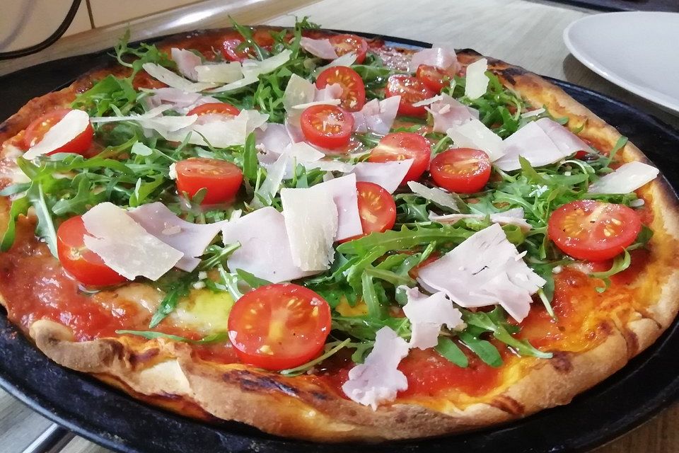 Pizza Rucola mit Knoblauchöl