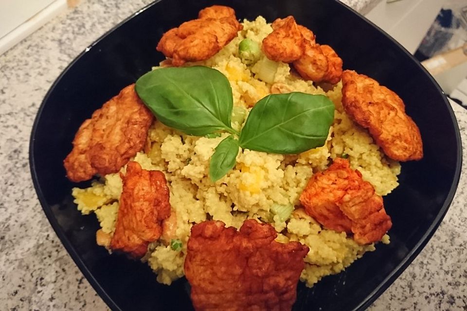 Currycouscous mit Mango und Erdnüssen