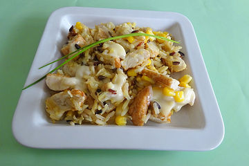 Reispfanne mit Mais, Hähnchenbrust und Käse