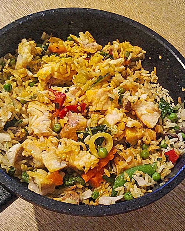 Curry-Fischpfanne mit Reis und Gemüse