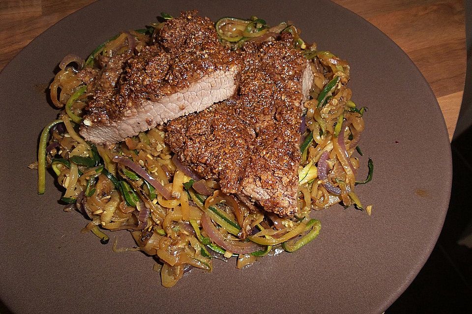 Überbackene Steaks mit Zucchini-Gemüse