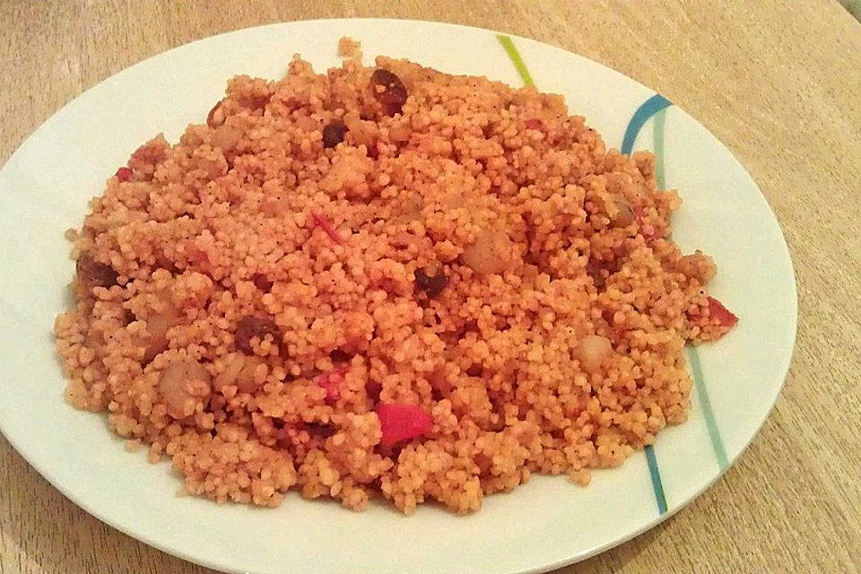 Pikante Couscous-Wokpfanne mit Fisch oder Geflügel