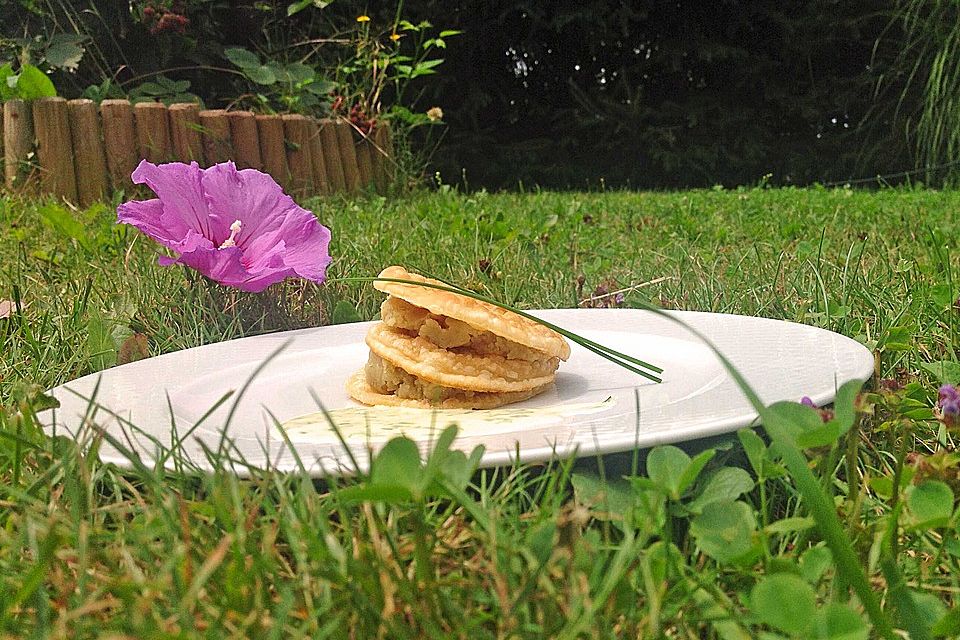 Steirische Goldtaler mit Kartoffelbrei und Sahnesauce