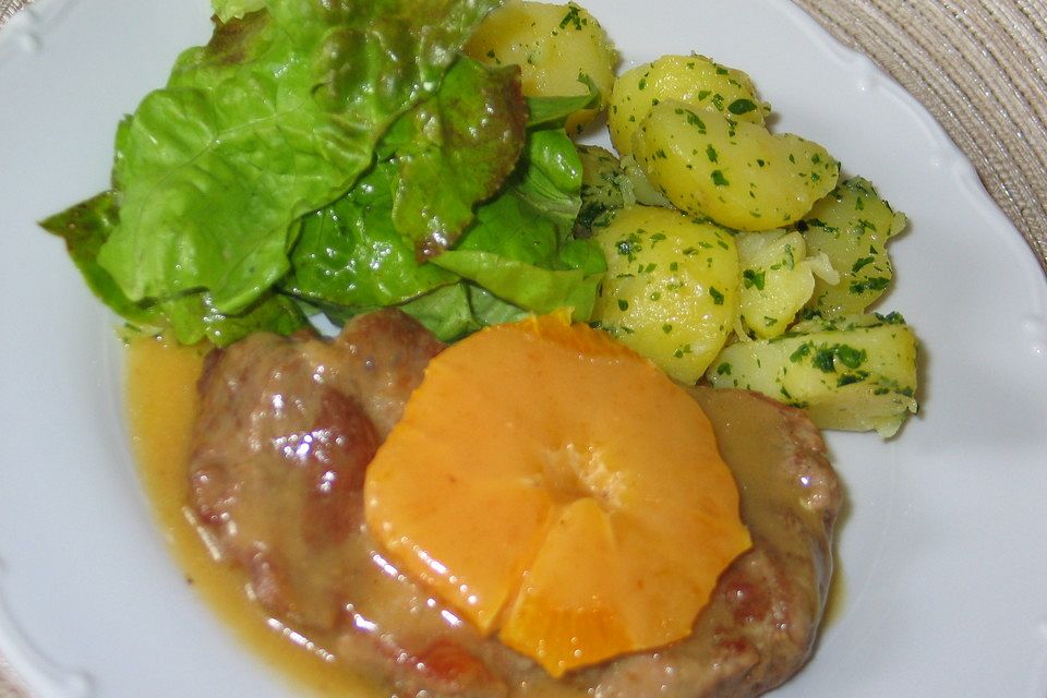 Schweinekotelett in Orangen-Honig-Sauce