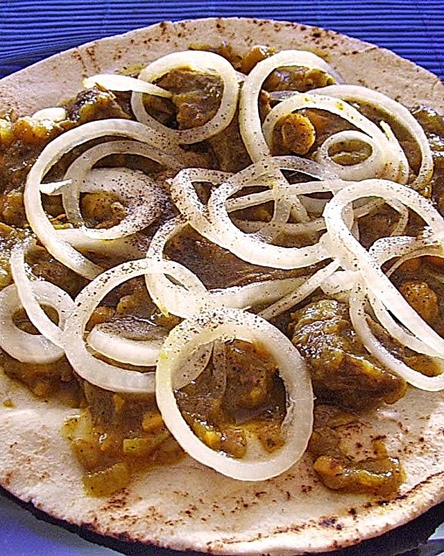 Afghanisches Zwiebelfleisch auf Fladenbrot