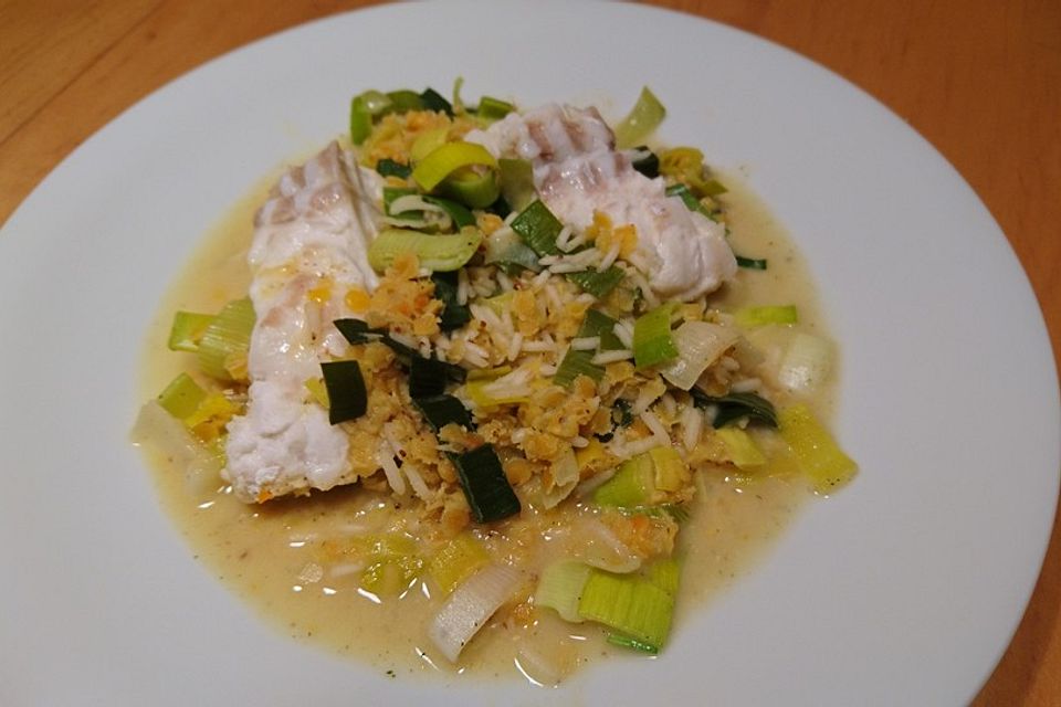 Fischfilet mit roten Linsen und Porree