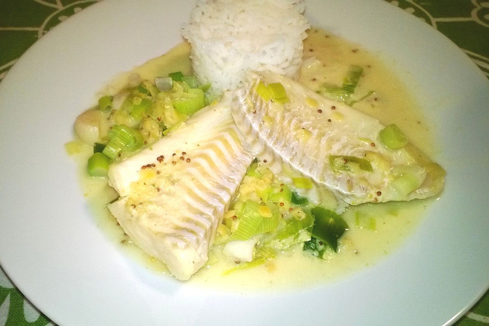 Fischfilet mit roten Linsen und Porree