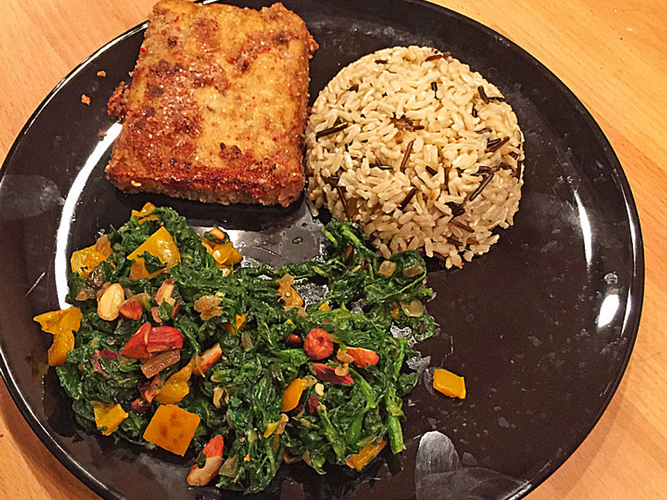 Mandel-Nuss-Tofu in einer Kruste aus Honig und rotem Pfeffer mit ...