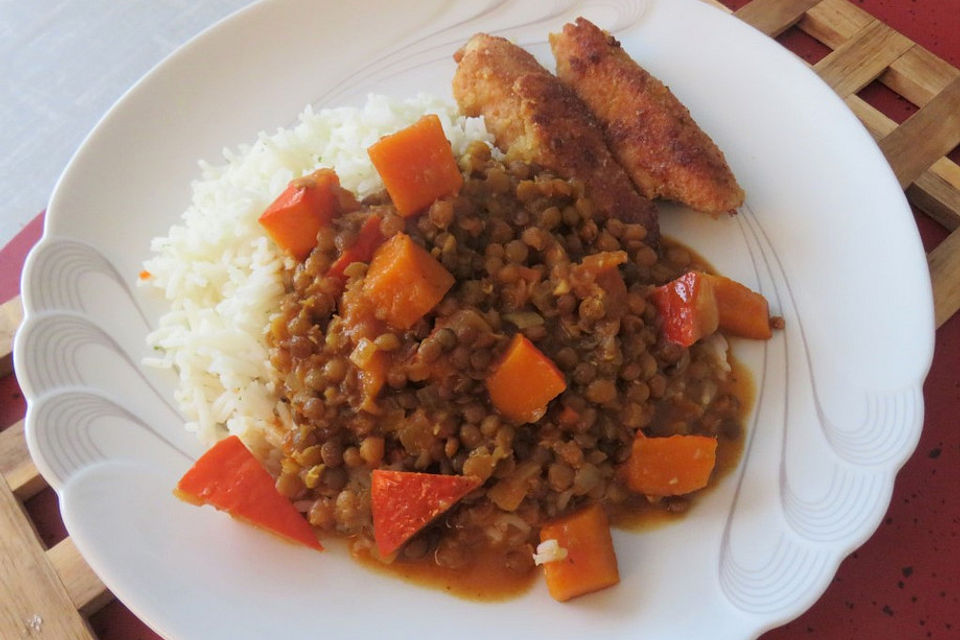 Hähnchenschenkel auf Kürbis-Linsen-Ragout