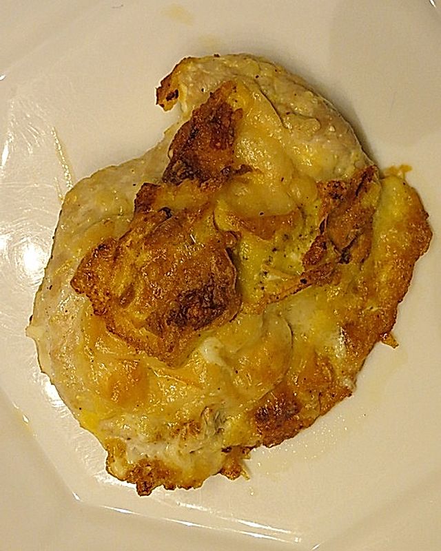 Putenschnitzel mit Parmesankruste