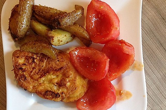 Parmesanschnitzel mit Tomatengemüse von ErikaSchmid| Chefkoch