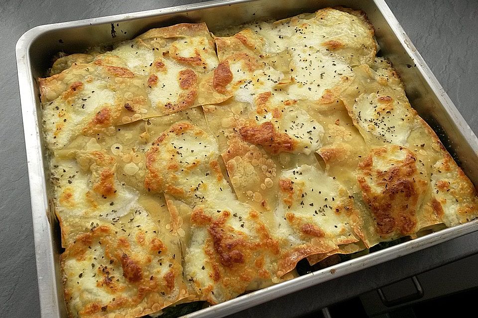 Spinatlasagne mit Pangasius, Lachs und Hackbällchen