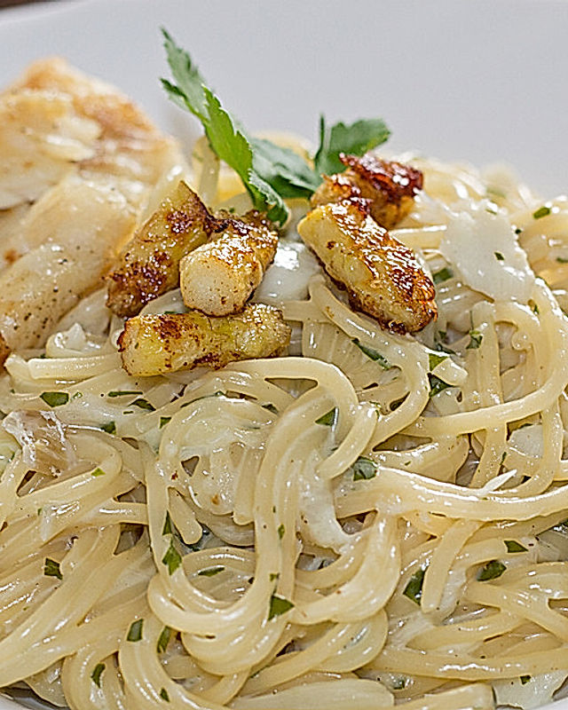 Spaghetti in Sahnesoße mit Spargel und Fischfilet