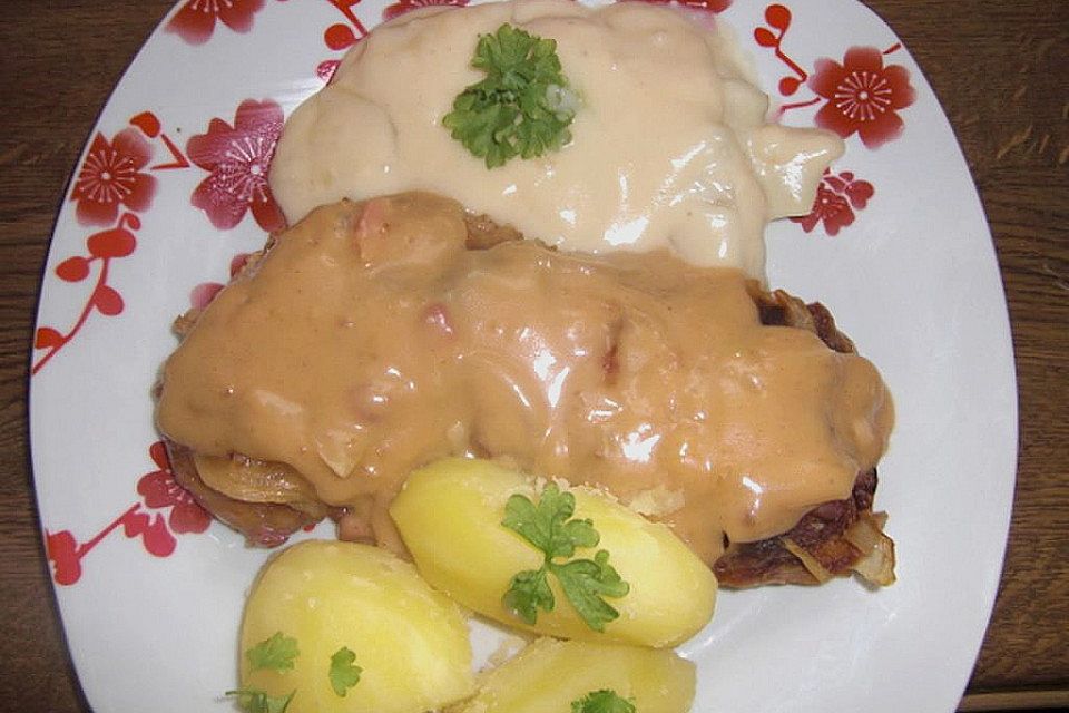 Schweineschnitzel in Käse - Rahm Soße