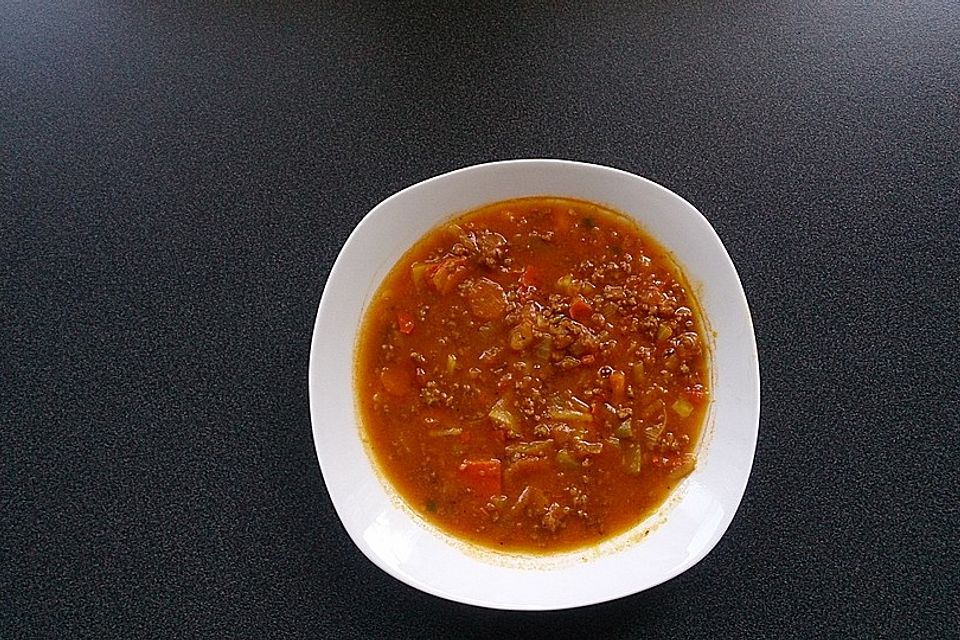 Kürbissuppe mit Hackfleisch, Honig und Boskoop