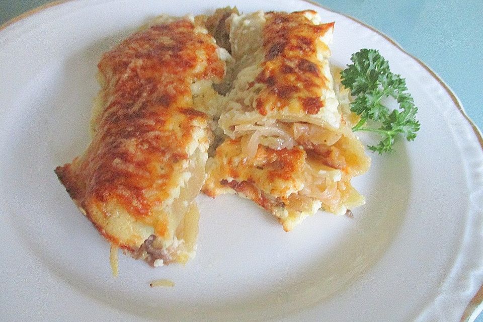 Überbackene Cannelloni mit Wirsing-Apfel-Zwiebel-Füllung in Kräuter-Bresso-Mascarpone-Sauce