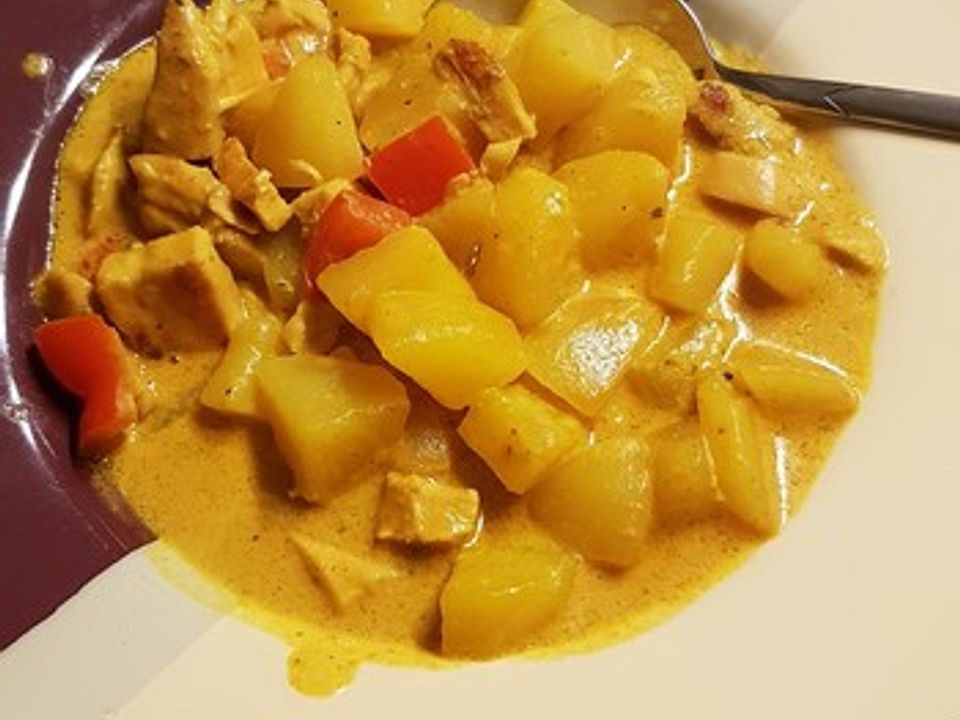 Indisches Hühnchen mit Kartoffeln in einer scharfen Madras Sauce von ...