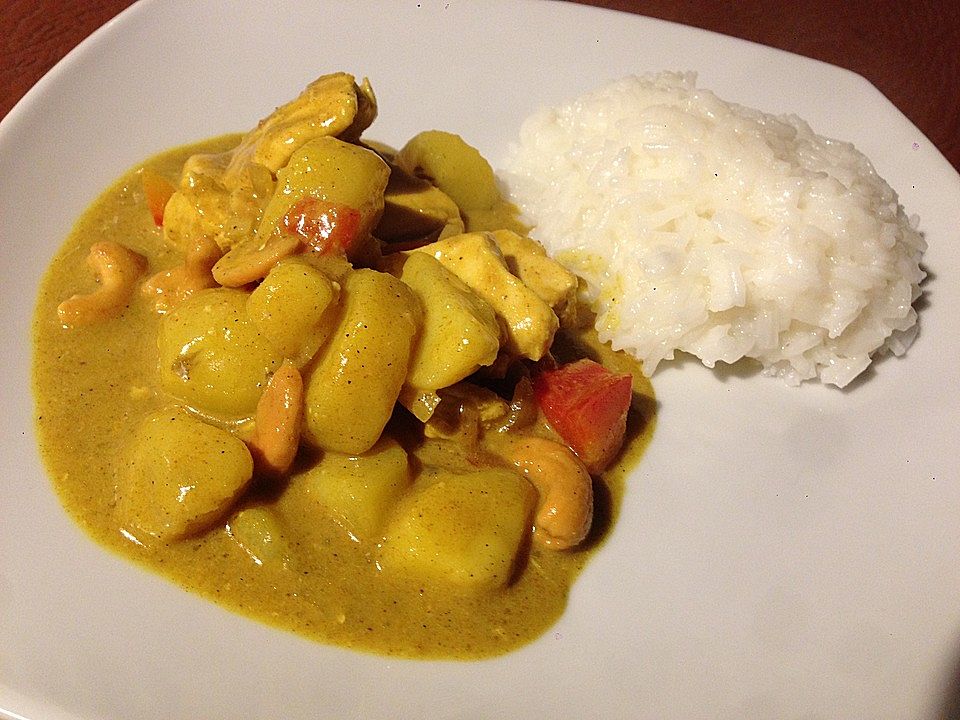 Indisches Hühnchen mit Kartoffeln in einer scharfen Madras Sauce von ...