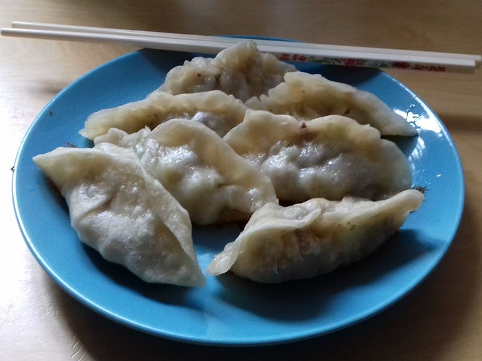 Chinesische Teigtaschen Jiaozi, Dumplings, Pot Sticker-Version von ...