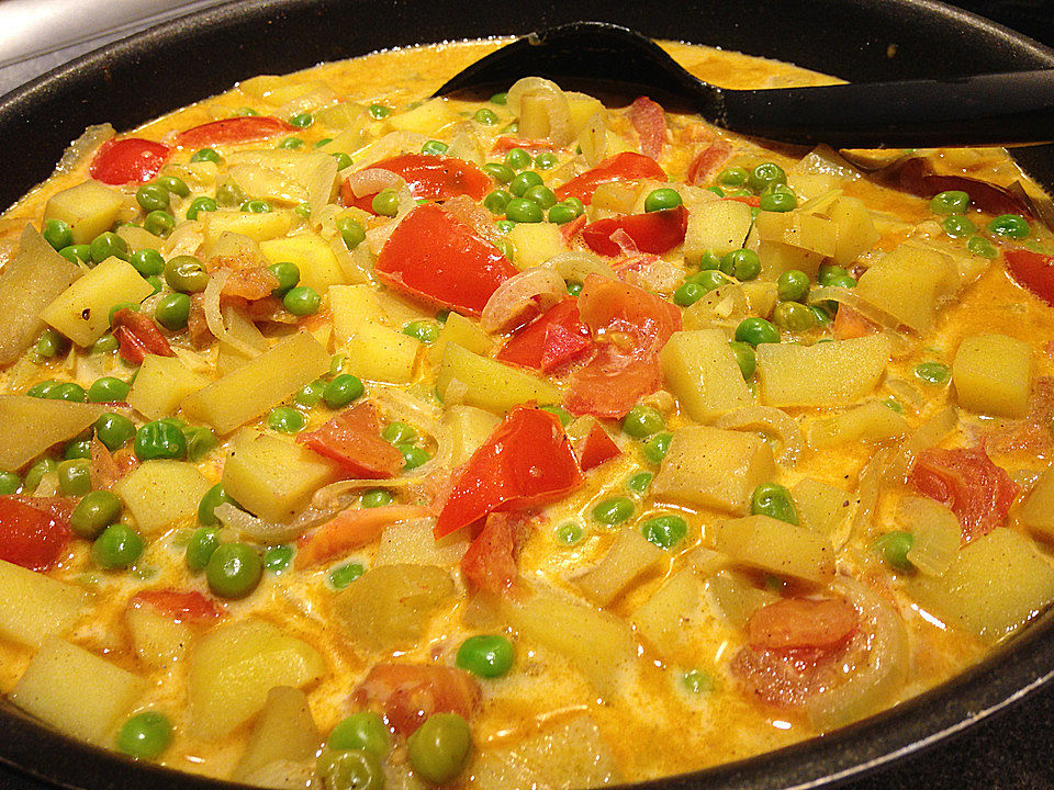 Kartoffelcurry mit Erbsen und Tomaten von Tiburonito| Chefkoch