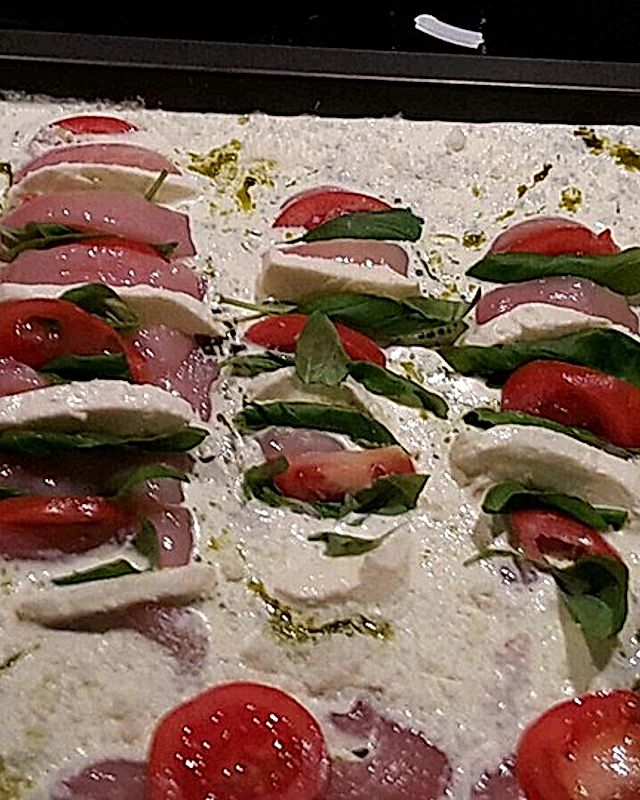 Tomaten-Mozzarella-Hähnchenbrust in Parmesansauce