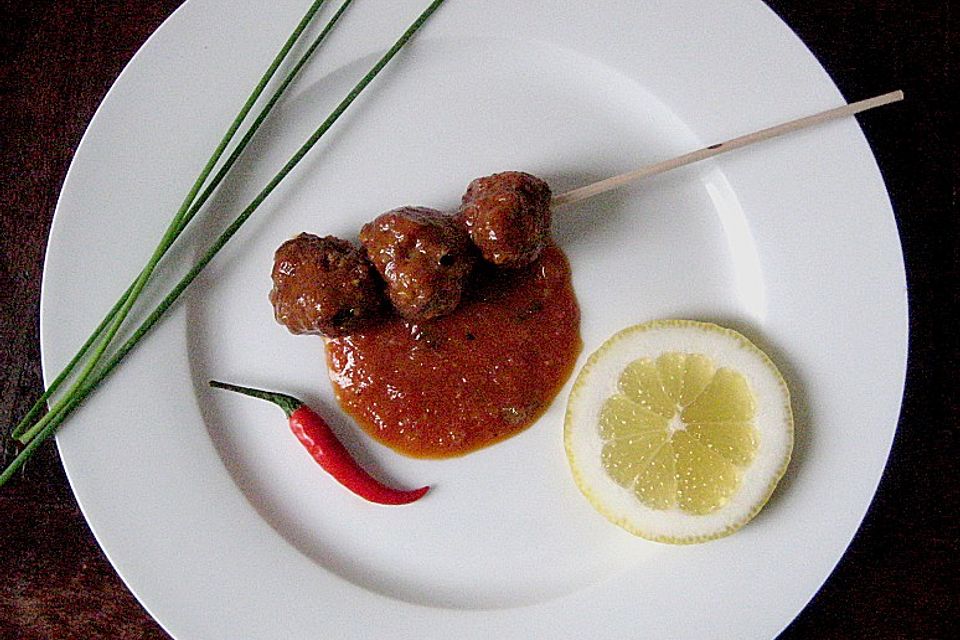 Hackbällchen in Orangen-Tomaten-Ragout