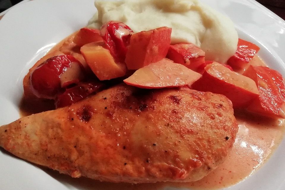 Hähnchen mit Kürbis und Tomaten