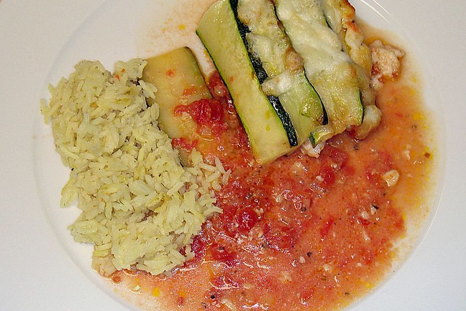 Rotbarschfilet auf pürierten Tomaten mit Zucchini - Mozzarellahaube