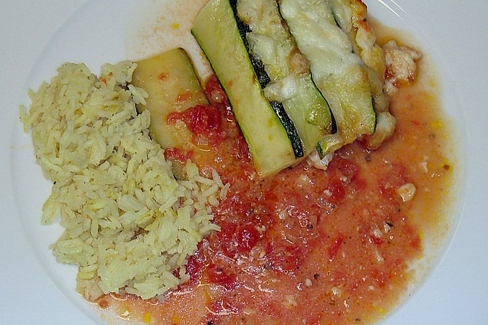 Rotbarschfilet auf pürierten Tomaten mit Zucchini - Mozzarellahaube