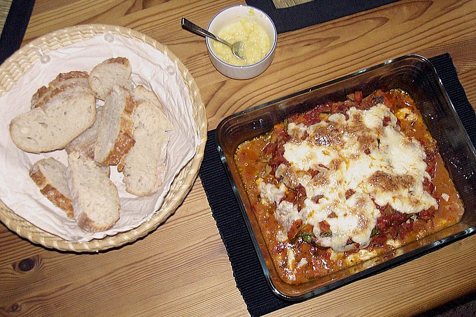 Rotbarschfilet auf pürierten Tomaten mit Zucchini - Mozzarellahaube